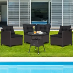 Costway 4PCS Patio Rattan Furniture Set Cushioned Sofa Glass Table Garden
